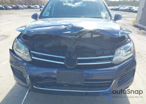 2014 Volkswagen Touareg Tdi Lux z USA, uszkodzony, nr VIN WVGEP9BP2ED014591